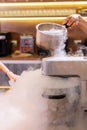 Smoke vapor dry ice in bowl in kitchen