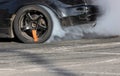 Smoke on wheel and Speed of drift race car Royalty Free Stock Photo
