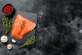 Smoked Atlantic salmon fillet. Organic fish. Black background. Top view. Copy space Royalty Free Stock Photo