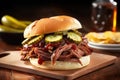 smoked beef brisket sandwich with pickles and bbq sauce Royalty Free Stock Photo