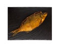 Smoked bream on a slate board. Royalty Free Stock Photo