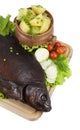 Smoked bream on a wooden board Royalty Free Stock Photo