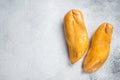 Smoked chicken breast fillet meat delicacy. White background. Top view. Copy space Royalty Free Stock Photo