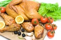 Smoked chicken legs and smoked chicken with vegetables closeup Royalty Free Stock Photo