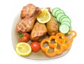 smoked chicken legs with vegetables and lemon on white background Royalty Free Stock Photo