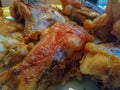 Smoked chicken wings at home in a smokehouse