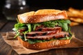 a smoked duck sandwich with lettuce