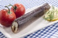 Smoked eel on a white plate Royalty Free Stock Photo
