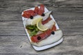 Smoked fish delicacies from the Northern seas halibut, salmon.Slices of smoked salmon and halibut on a plate with a slice of lemon Royalty Free Stock Photo