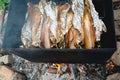Smoked fish on fire Royalty Free Stock Photo