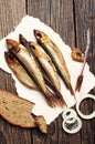 Smoked fish on wooden table Royalty Free Stock Photo