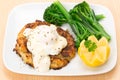 Smoked haddock fishcake dinner with a poached egg Royalty Free Stock Photo
