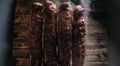 Smoked ham, bacon, pork in a smokehouse. Traditional method of smoking meat in smoke. banner, menu, recipe place for text