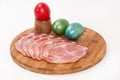 Smoked ham with colorful Easter eggs Royalty Free Stock Photo