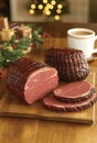 A smoked ham roast sliced and ready to serve Royalty Free Stock Photo