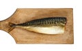 Smoked headless mackerel on kitchen wooden board Royalty Free Stock Photo