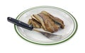 Smoked herring fillets on plate with fork Royalty Free Stock Photo