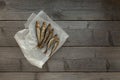 Smoked herring fish on a wooden background. Food composition Royalty Free Stock Photo