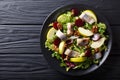 Smoked mackerel with apples, walnuts, beets and various lettuce Royalty Free Stock Photo