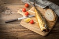 Smoked mackerel and bread. Royalty Free Stock Photo