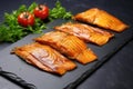 smoked mackerel fillets on a stone slate