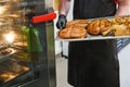 Smoked meat products in the oven smokehouse. Royalty Free Stock Photo