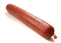 Smoked meat sausage isolated on white background. Traditional beef salami Royalty Free Stock Photo