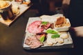 Smoked Meat Snack Beer Set Top View. Barbecue Buffet of Sudzhuk, Horseflesh, Beef Jerky, Cheese Balls, Smoked Sausages Royalty Free Stock Photo