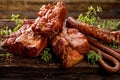 Smoked meats and sausages. A set of traditional smoked meats and sausages: ham,gammon, pork loin, home-style sausages, kabanosy. Royalty Free Stock Photo