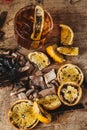 Smoked old fashioned cocktail on dark wooden background