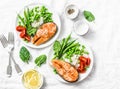 Smoked paprika baked salmon, rice, green peas and green beans on a light background, top view. Flat lay. Healthy balanced mediterr Royalty Free Stock Photo