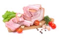 Smoked pork belly, bacon, ham on a wooden chopping board. White isolated background Royalty Free Stock Photo