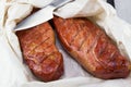 Smoked pork tenderloins. Homemade smoked pork ham. Royalty Free Stock Photo