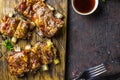 Smoked Roasted pork ribs over black background.