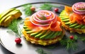 Smoked salmon with avocado and red onion on potato cakes