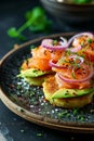 Smoked salmon with avocado and red onion on potato flatbread. Selective focus.