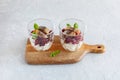 Smoked salmon, beetroot and soft cheese salad served in two glasses Royalty Free Stock Photo