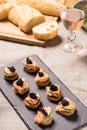 Smoked Salmon Canapes with Sour Cream and Caviar Royalty Free Stock Photo