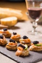 Smoked Salmon Canapes with Sour Cream and Caviar Royalty Free Stock Photo