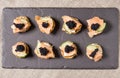 Smoked Salmon Canapes with Sour Cream and Caviar Royalty Free Stock Photo