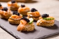 Smoked Salmon Canapes with Sour Cream and Caviar Royalty Free Stock Photo