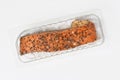 Smoked salmon fillet topped with pepper in plastic packaging Royalty Free Stock Photo