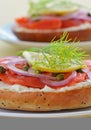 Smoked salmon lox on poppy seed onion bagel Royalty Free Stock Photo