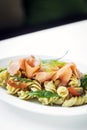 Smoked salmon organic tomato and basil fresh pasta salad Royalty Free Stock Photo