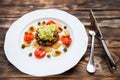 Smoked salmon salad with potato rosti and creme fraiche. Overhead view. Royalty Free Stock Photo