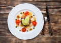 Smoked salmon salad with potato rosti and creme fraiche. Overhead view. Royalty Free Stock Photo