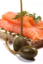 Smoked salmon sandwich, capers Royalty Free Stock Photo