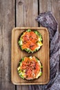 Smoked salmon, scrambled eggs and avocado rye crisp toast