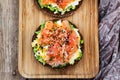 Smoked salmon, scrambled eggs and avocado rye crisp toast