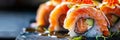 Smoked Salmon Sushi Rolls, Japanese Susi with Green Onions, Flying Fish Red Caviar, Spicy Sauce Royalty Free Stock Photo